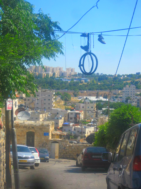 Shoe tossing, shoes on a wire is everywhere in Jerusalem streets